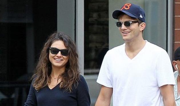 Ashton Kutcher: Αγκαλιάζει πρoστατευτικά την κοιλίτσα της Mila Kunis σε μουσικό φεστιβάλ