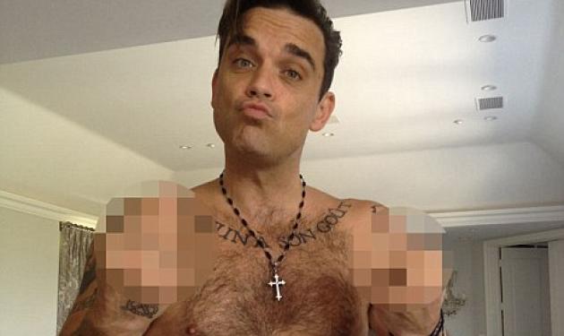 Tι τσάντισε τον Robbie Williams και ανέβασε φωτογραφία με απρεπή χειρονομία;