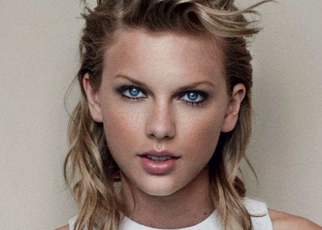 Στο είχαμε πει ότι είναι τάση! Η Taylor Swift ποζάρει με ψεύτικες φακίδες για την Vogue!