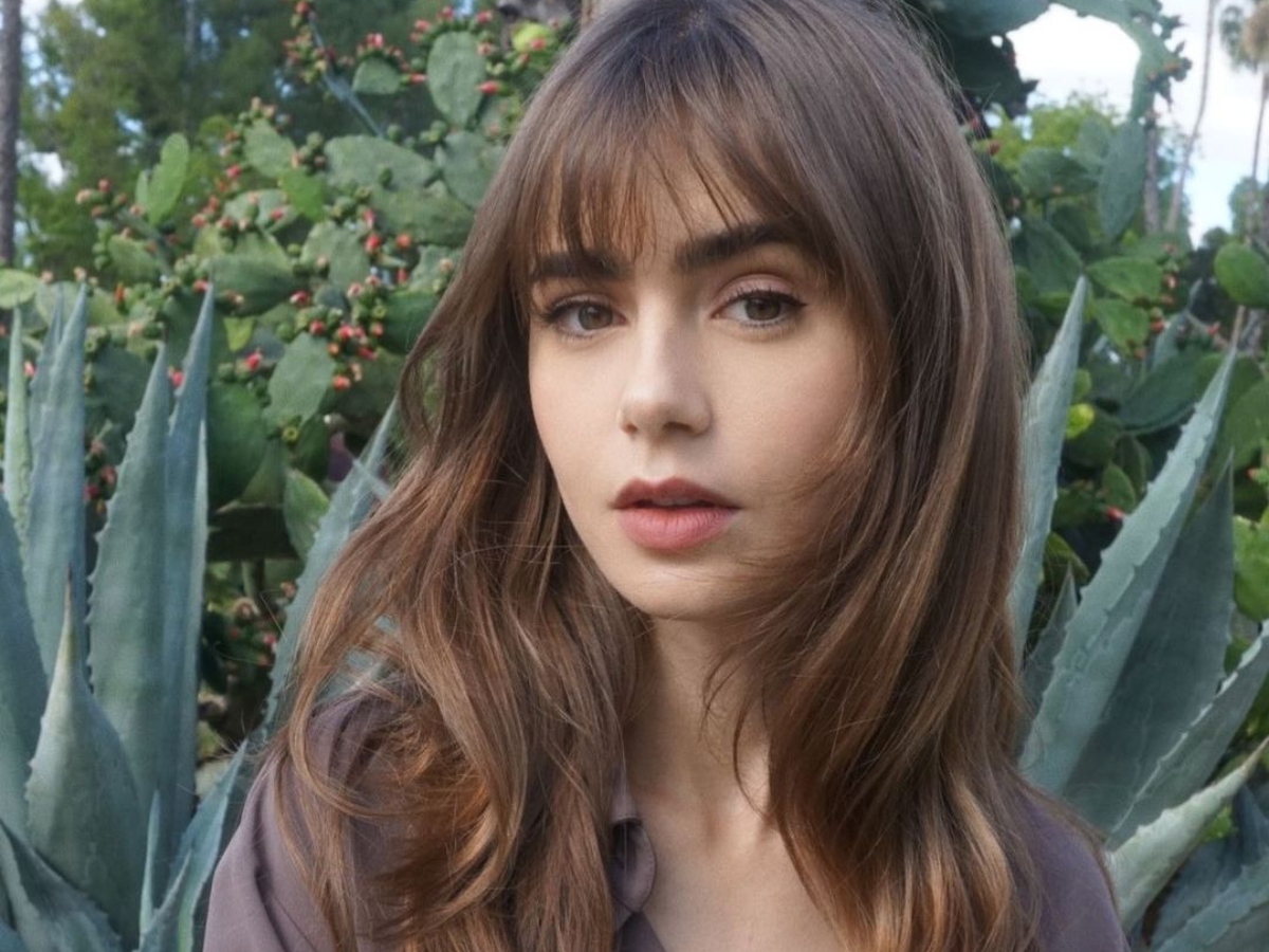 H Lily Collins υιοθέτησε τον πιο χαριτωμένο και French-Girl ψηλό κότσο