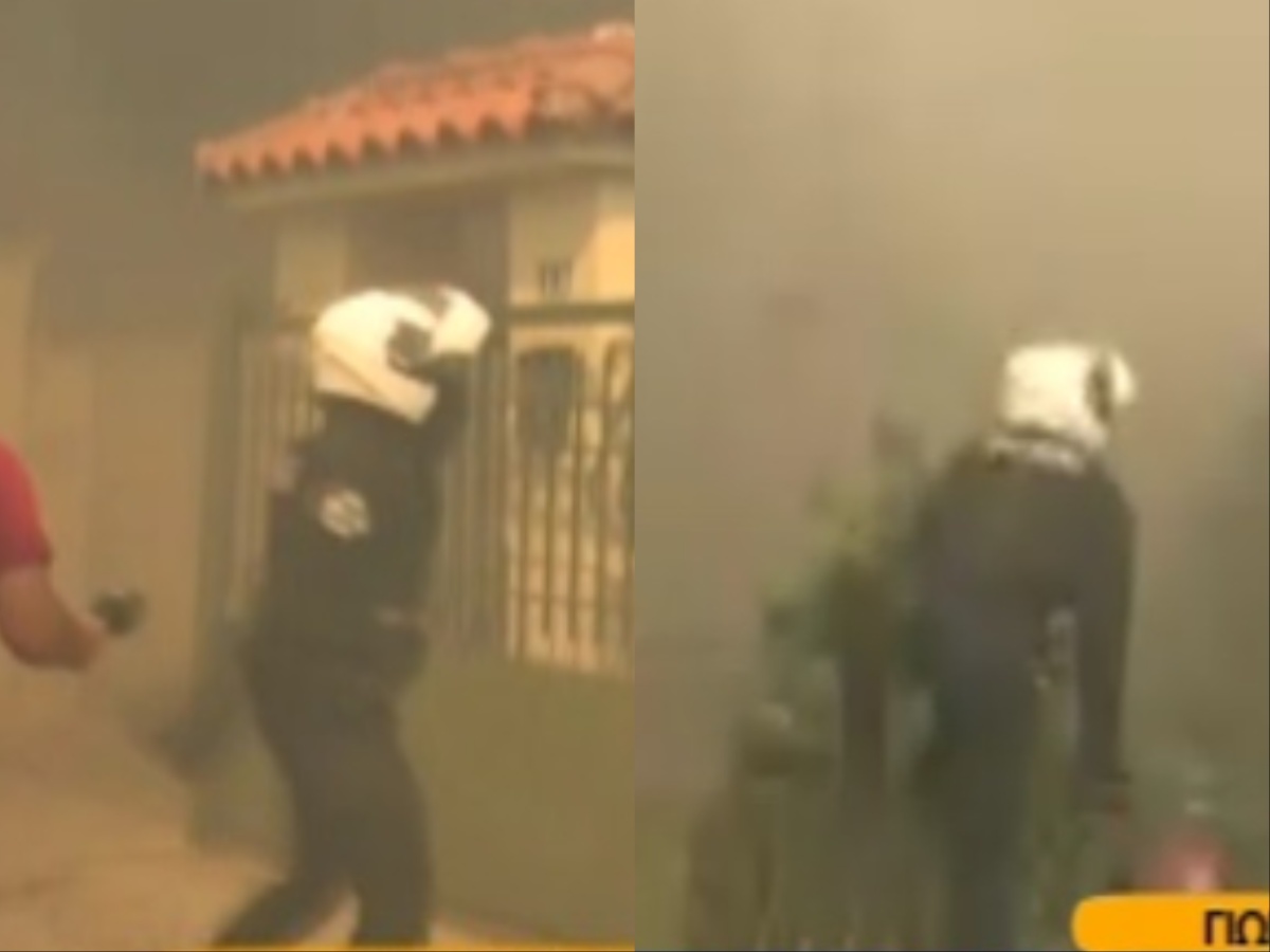 Φωτιά στην Πάρνηθα: Η συγκλονιστική στιγμή που αστυνομικός μπαίνει σε σπίτι που έχει παραδοθεί στις φλόγες